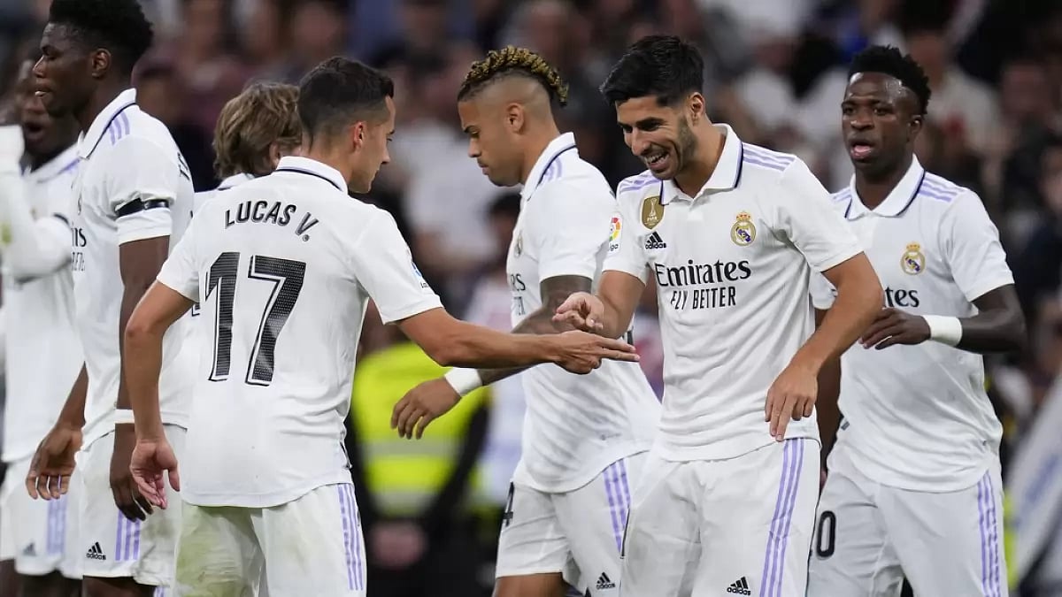 Asensio, second right, celebrates with his team-mates after scoring his team's goal on Saturday.