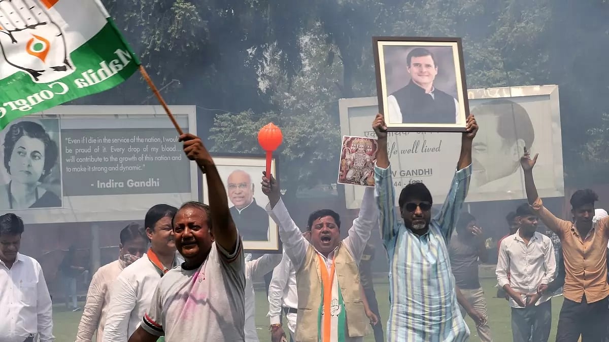 Congress supporters celebrate after results of Karnataka assembly elections