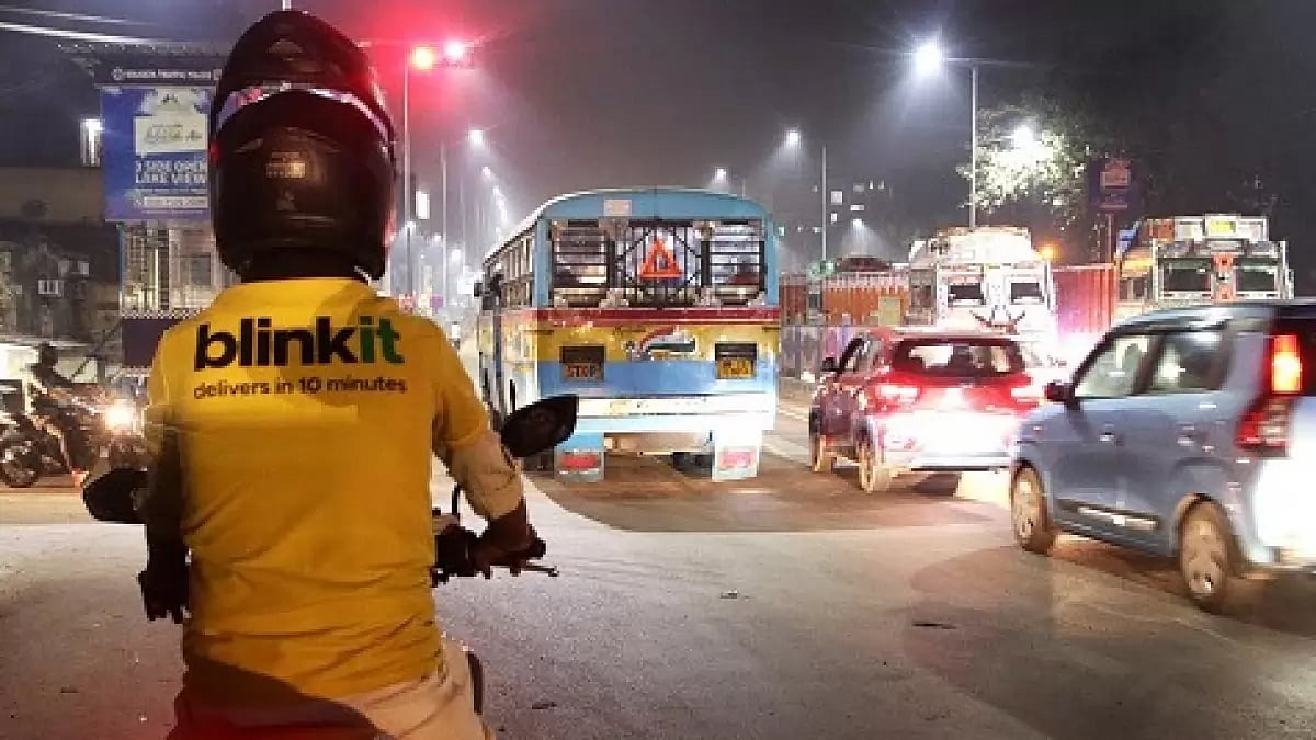 A Blinkit delivery partner on the road