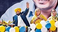 Victory Signs: Punjab chief minister Bhagwant Mann waves at his supporters