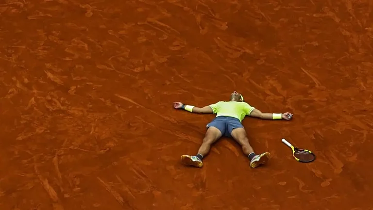 Nadal after his record 12th French Open tennis tournament title win against Thiem in 2019. - null
