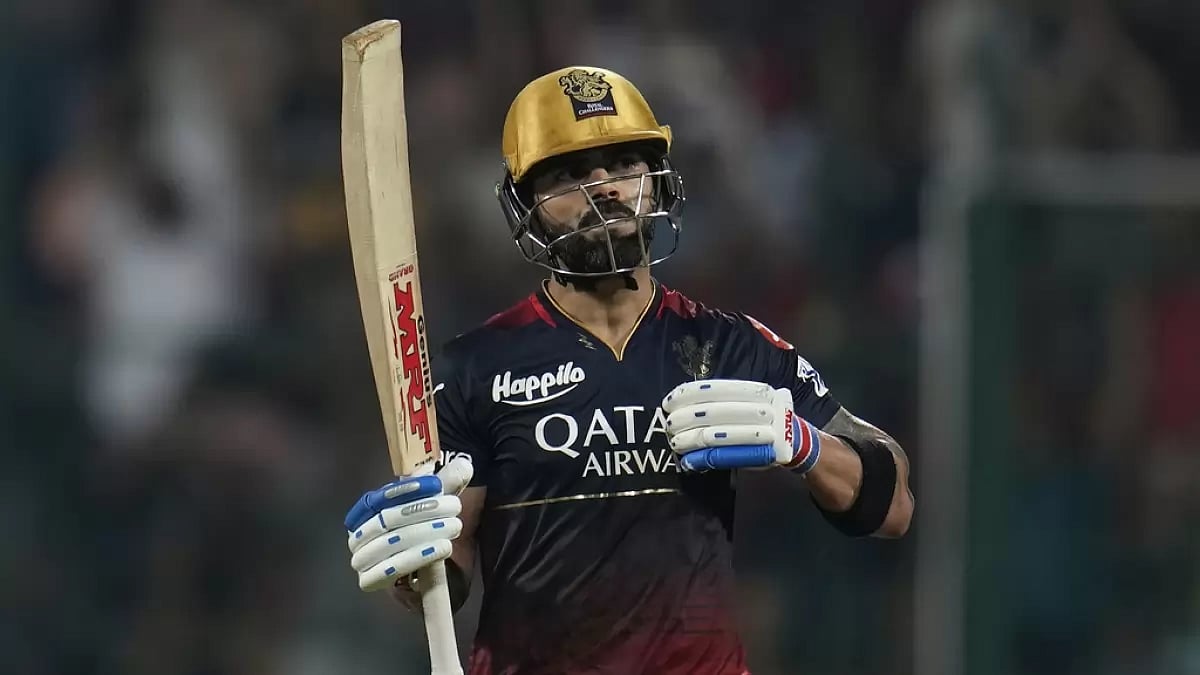 Kohli celebrates after reaching his hundred against GT in Bengaluru on Sunday.