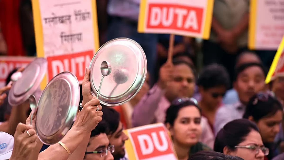 Protest over regularisation of ad hoc teachers in Delhi University.