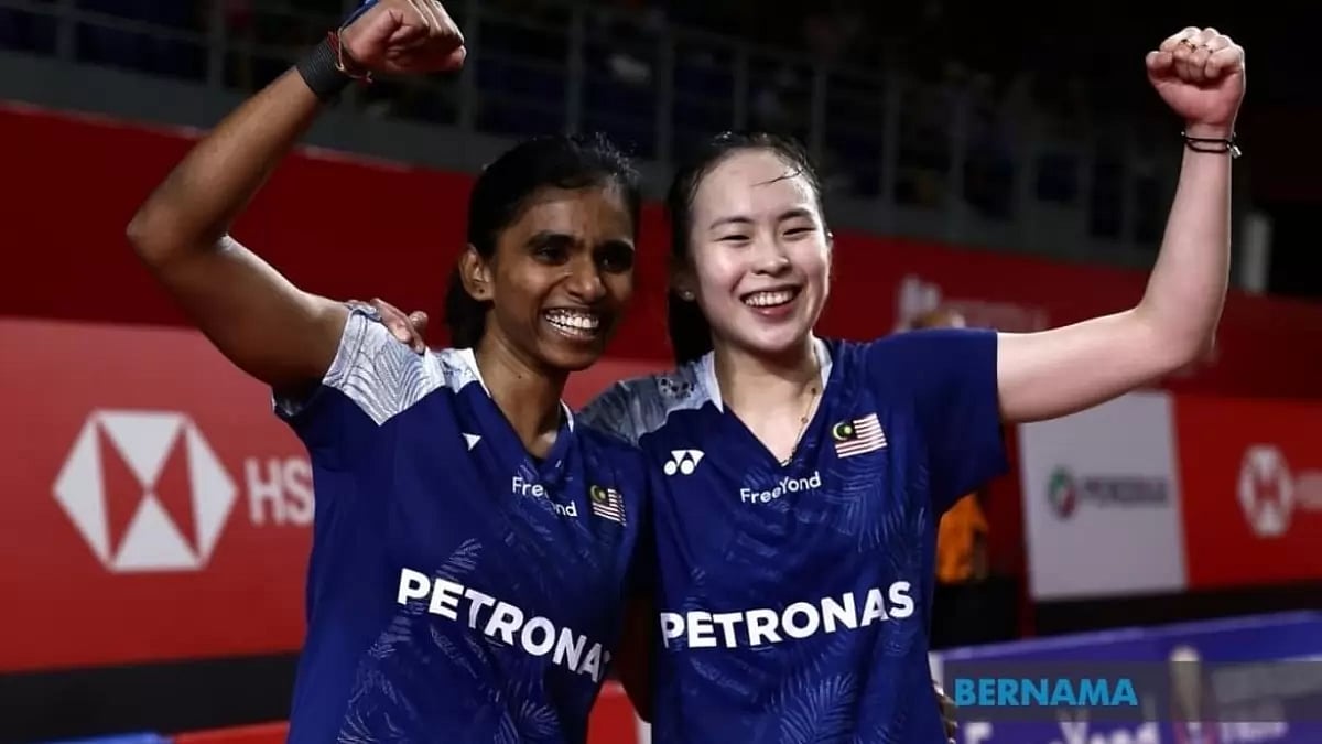 The Malaysian pair of Pearly Tan and Thinaah Muralitharan celebrate their win on Friday.