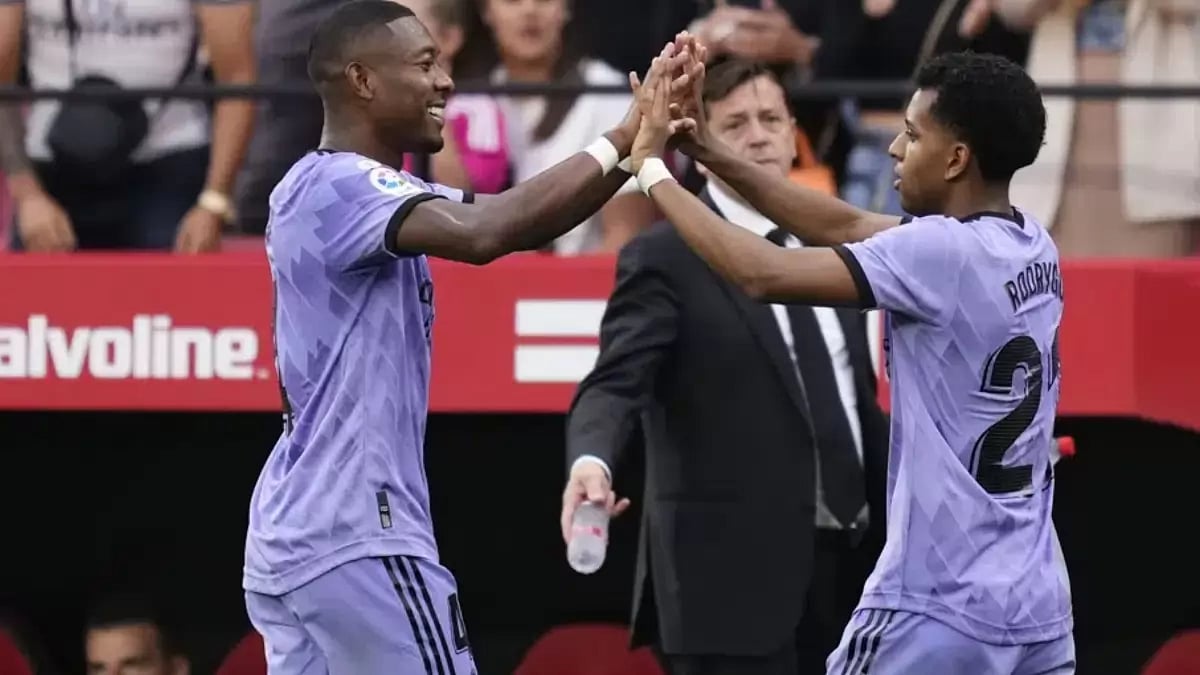 Real Madrid's Rodrygo, right, celebrates with David Alaba after scoring his side's second goal.