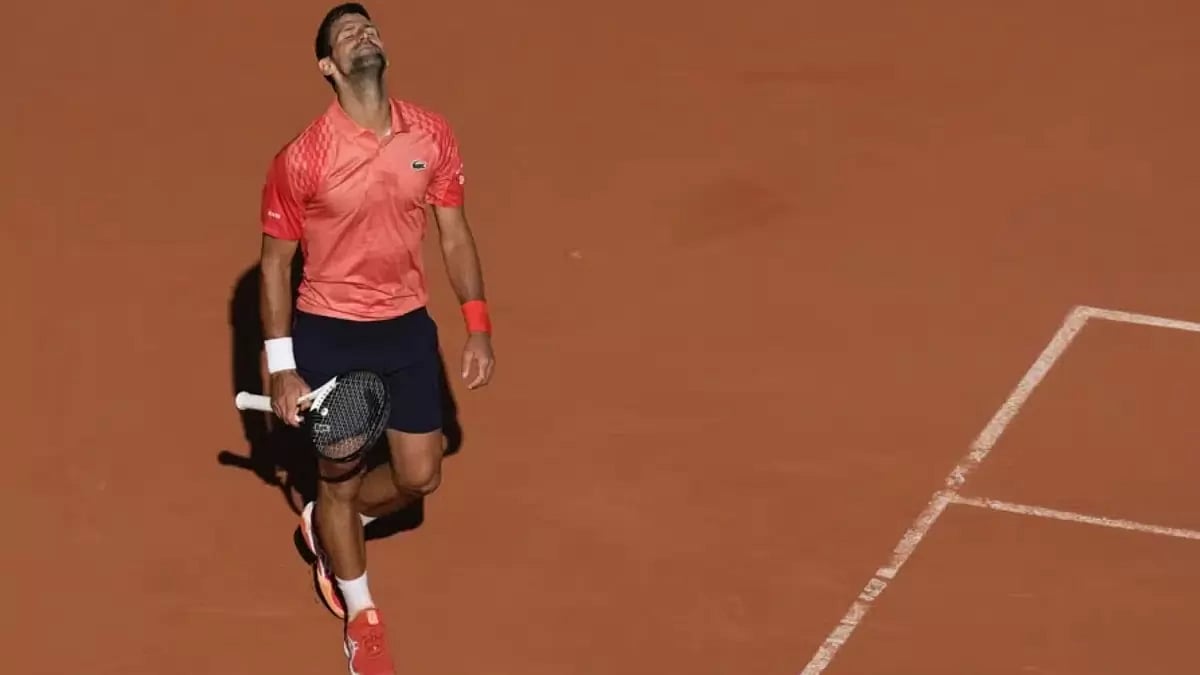 Serbia's Novak Djokovic reacts after missing a shot against Spain's Alejandro Davidovich Fokina.