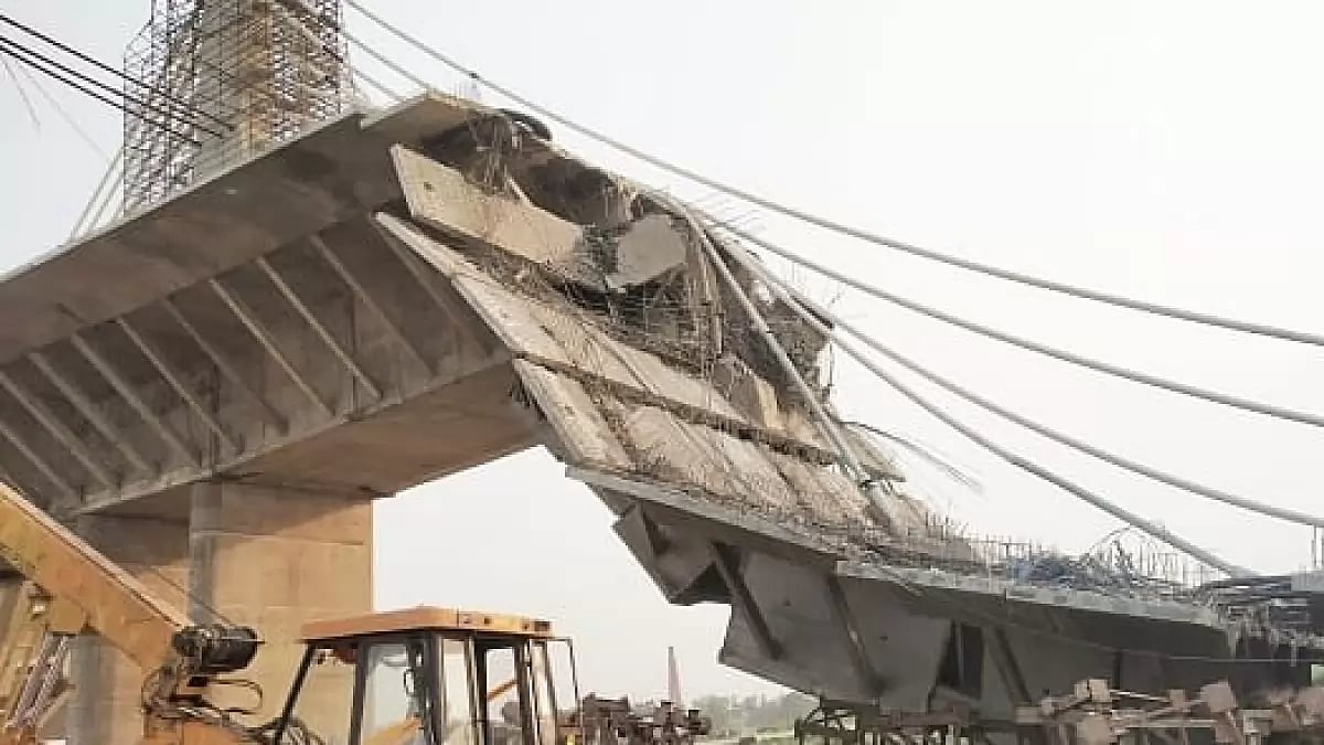 A portion of an underconstruction mega-bridge on Ganga near Sultanganj caved in.