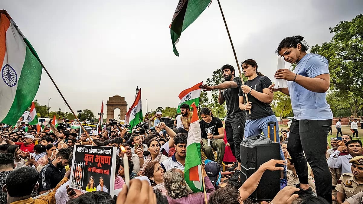 Thanking Supporters: Protesting wrestlers light candles at India Gate