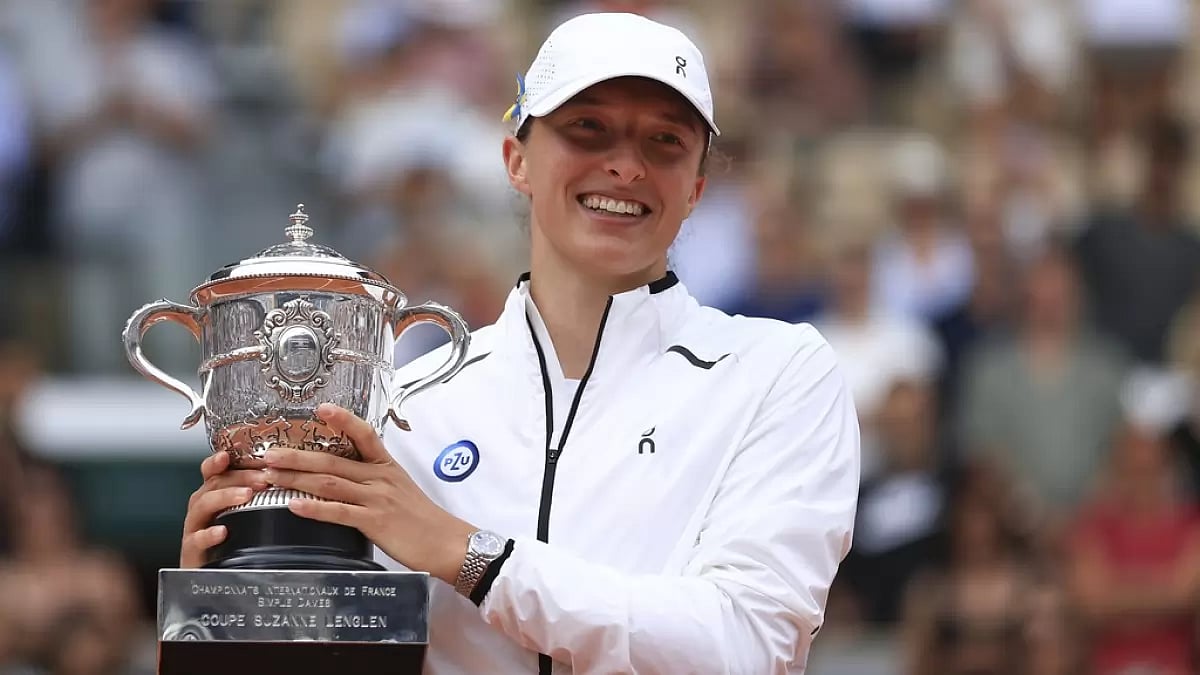 Swiatek celebrates after winning the women's singles final against Muchova on Saturday.