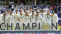 Andrew McDonald Credits 'Sub-Continent Journey' For WTC Triumph The Australian team celebrate as captain Pat Cummins holds the winners trophy.