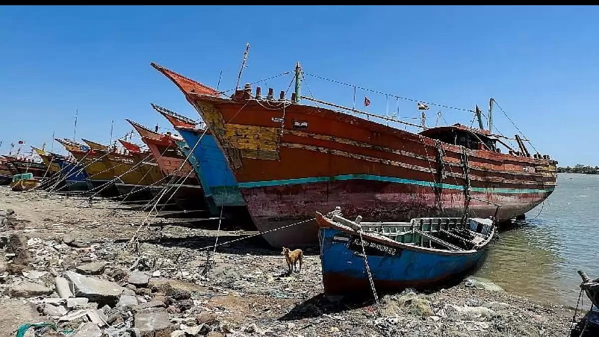 Fishing boats docked ahead of Cyclone Biparjoy, at a harbour in Jakhau village of Kutch, Gujarat