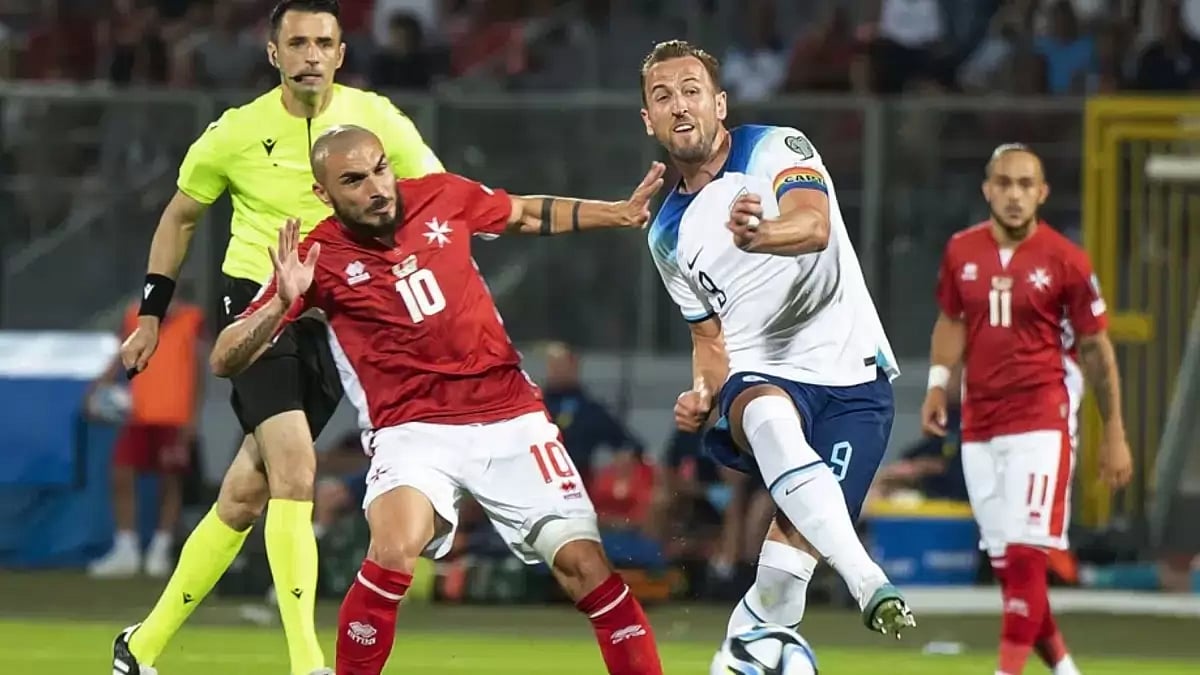 England's Harry Kane (R) in action against Malta.