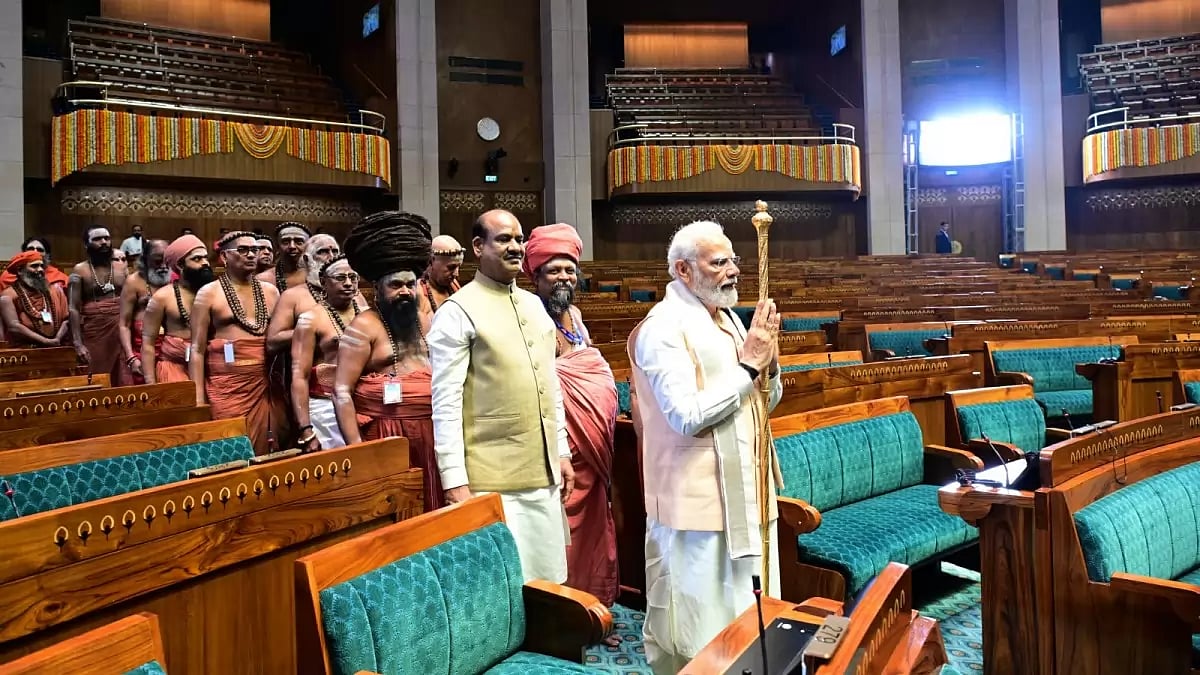 Prime Minister Narendra Modi with the 'Sengol' at the New Parliament building