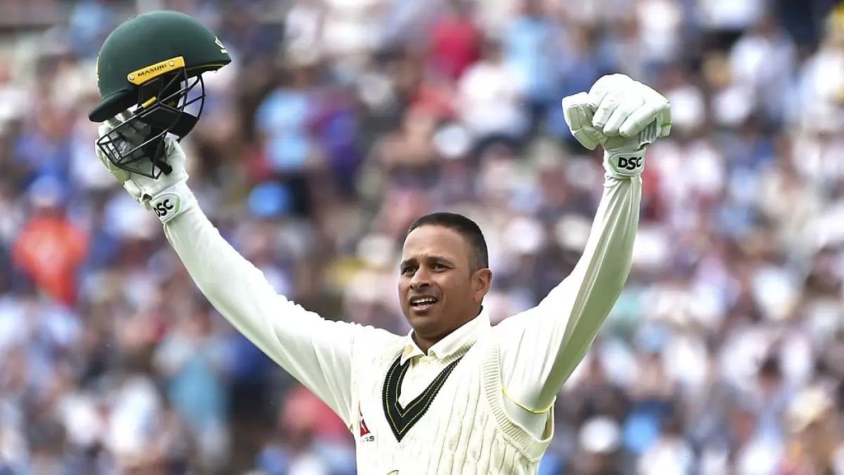 Khawaja celebrates after reaching his hundred against England on Saturday.
