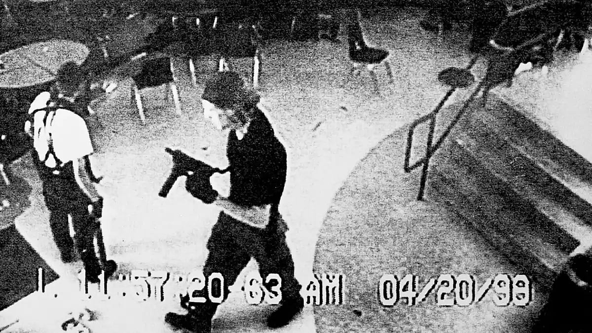 Unforgettable Tragedy: Columbine High School shooters Eric Harris (L) and Dylan Klebold captured on surveillance cameras during their shooting spree - null