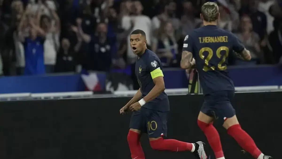 Kylian Mbappe celebrates after scoring against Greece.