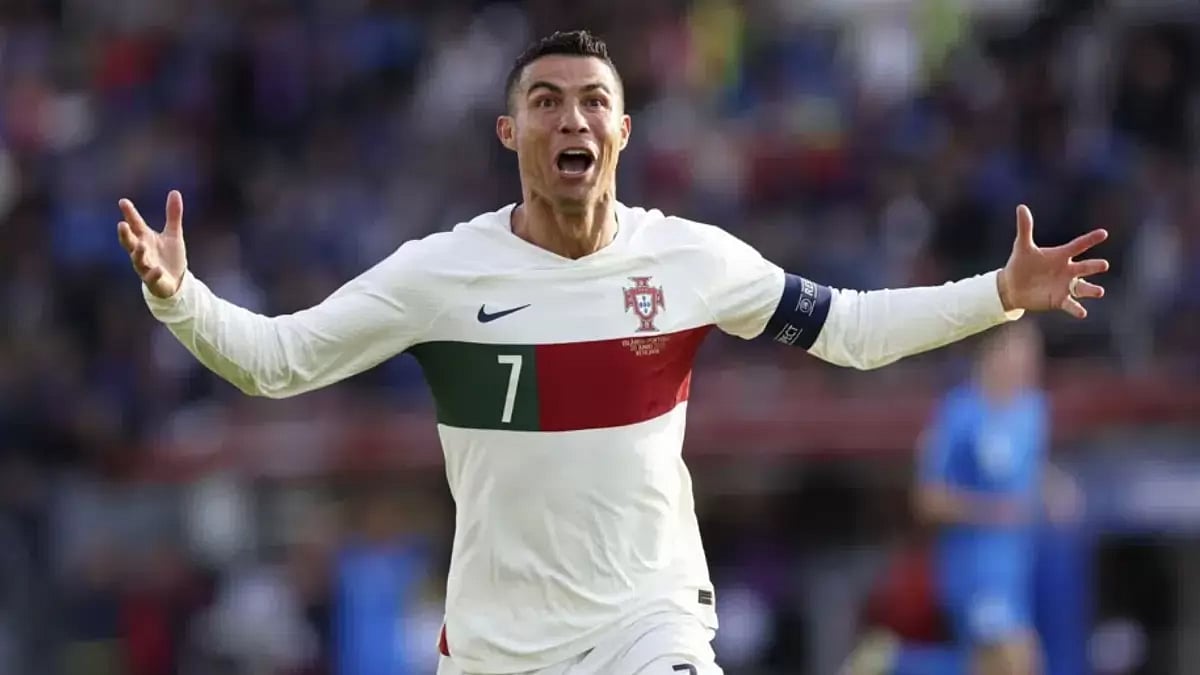 Cristiano Ronaldo celebrates after scoring his side's first goal during the Euro 2024 game.