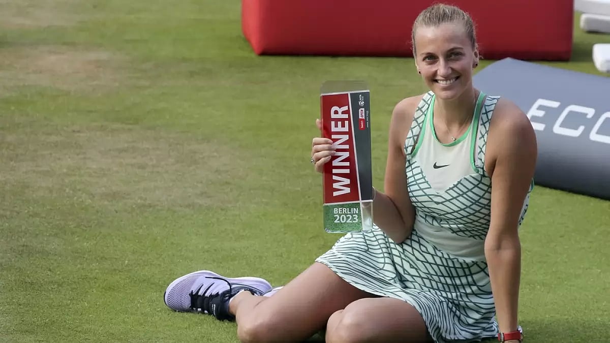Kvitova poses with the Berlin Open title after her victory over Vekic on Sunday.