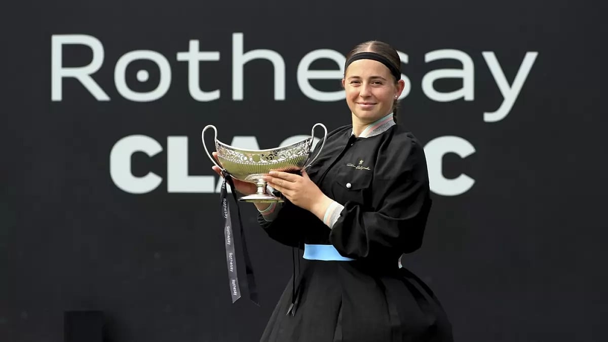 Ostapenko poses with her Birmingham Classic title on Sunday.