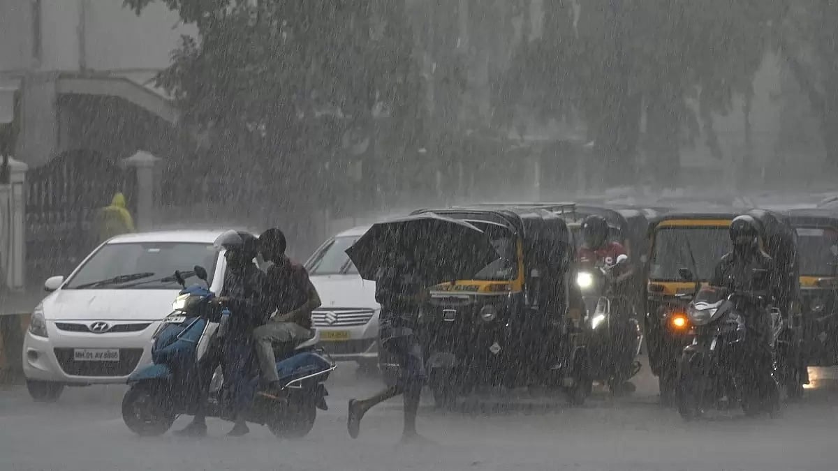 Vehicles wade amid heavy rains at Andheri, in Mumbai