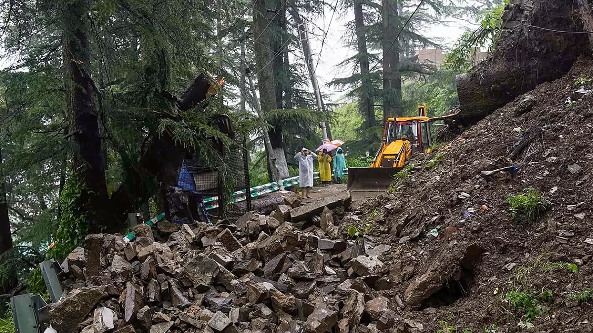 A retaining wall collapsed following heavy monsoon rains, in Shimla.