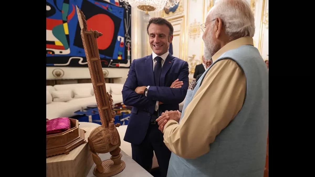 PM Modi's gifts French President Emmanuel Macron a Sandalwood replica of Sitar