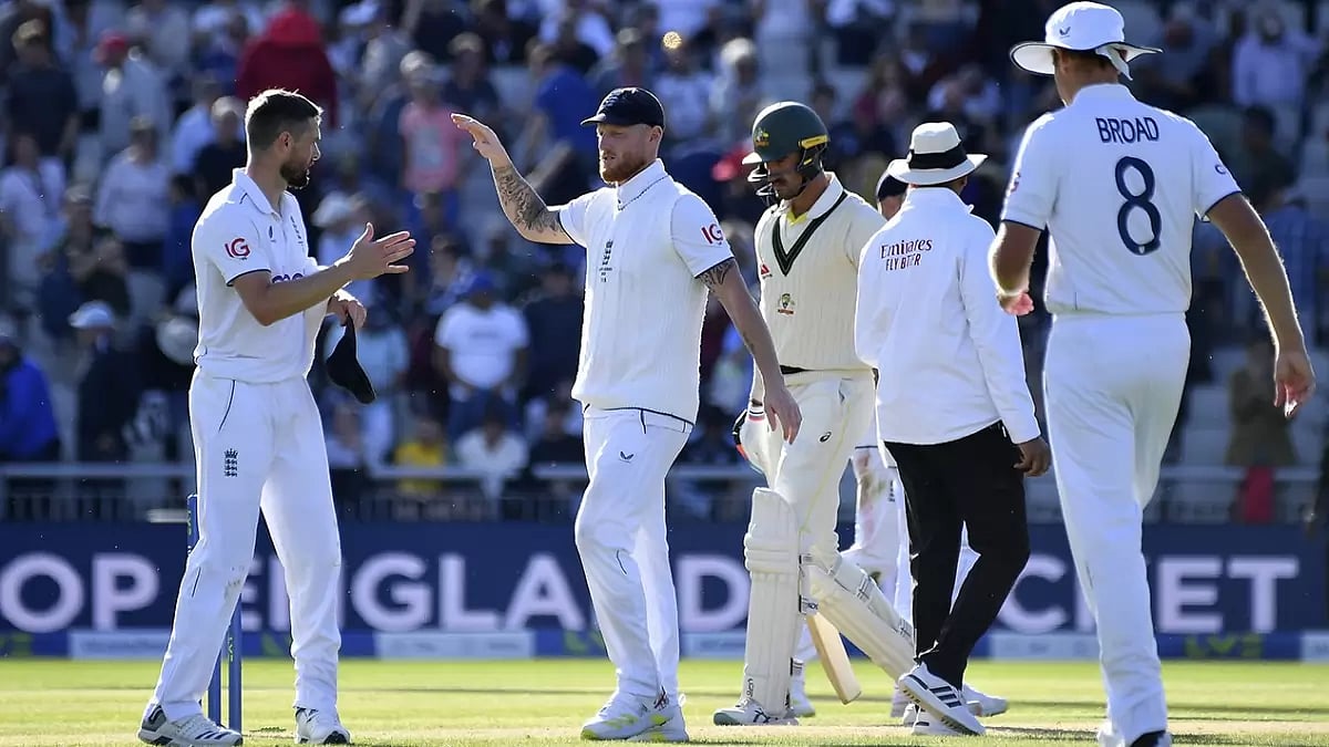 Englands captain Ben Stokes, second left, celebrates with teammate Chris Woakes.