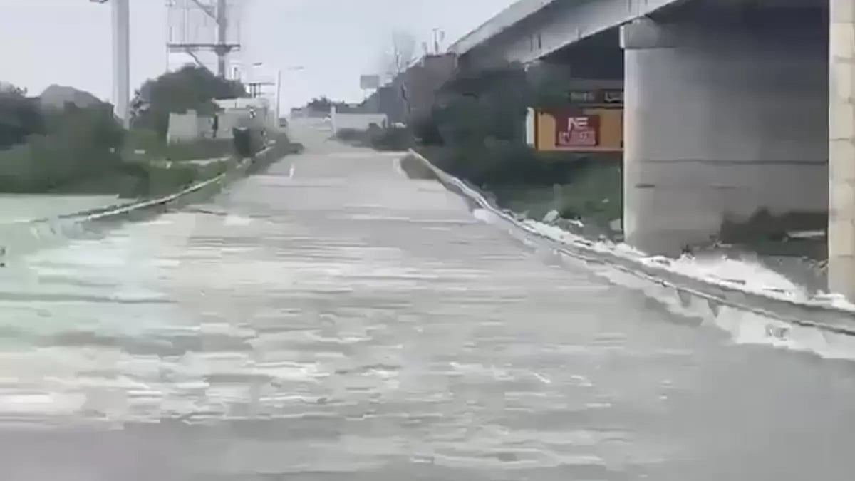 Flood water overflowing onto ORR service road in Telangana