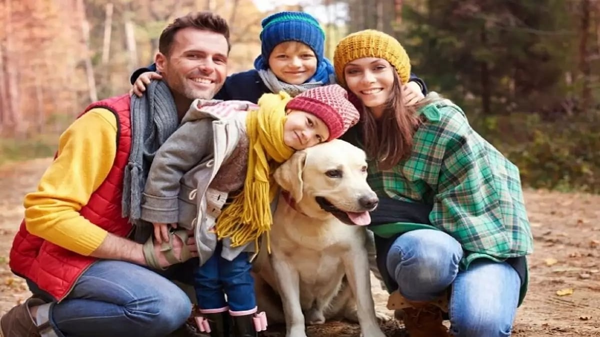 A family photo with their pet
