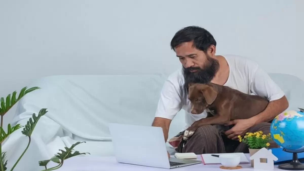 A man  with their pet.