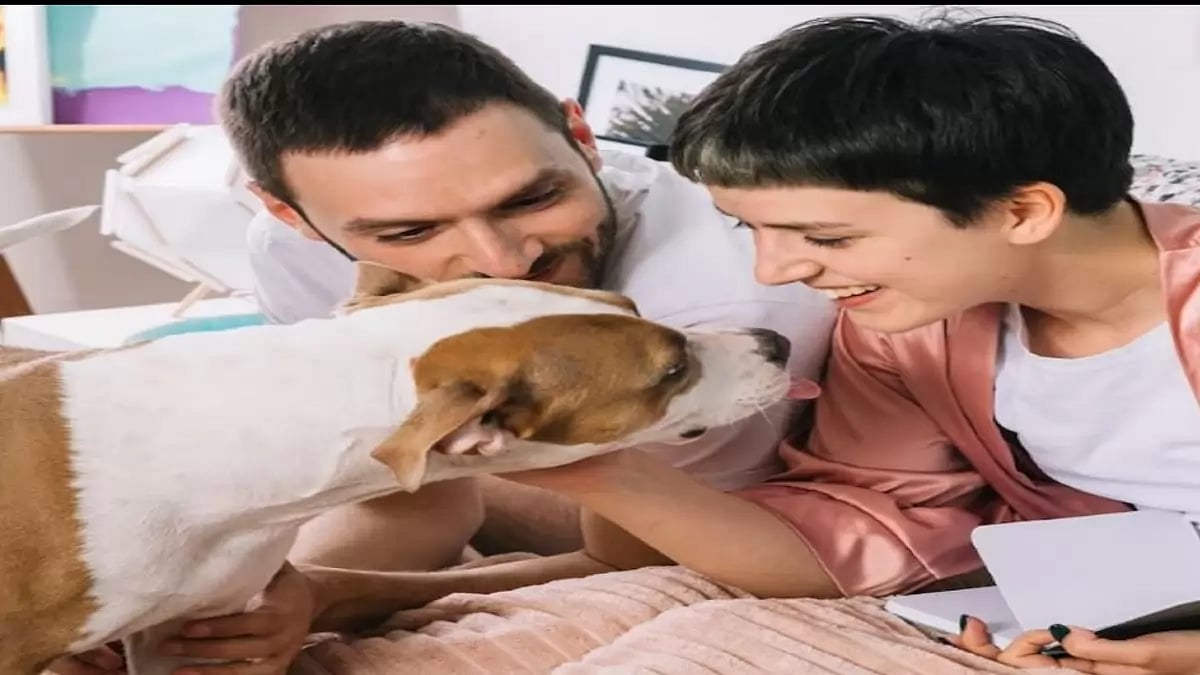  A couple with their pet.