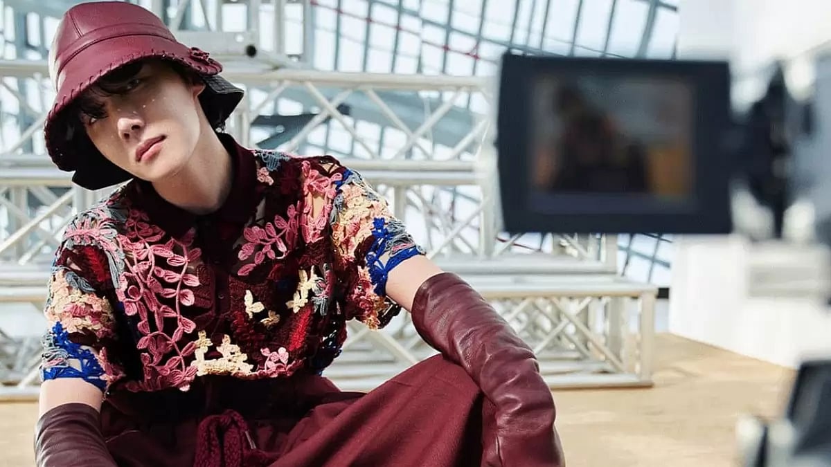 A male model wearing Louis Vuitton 