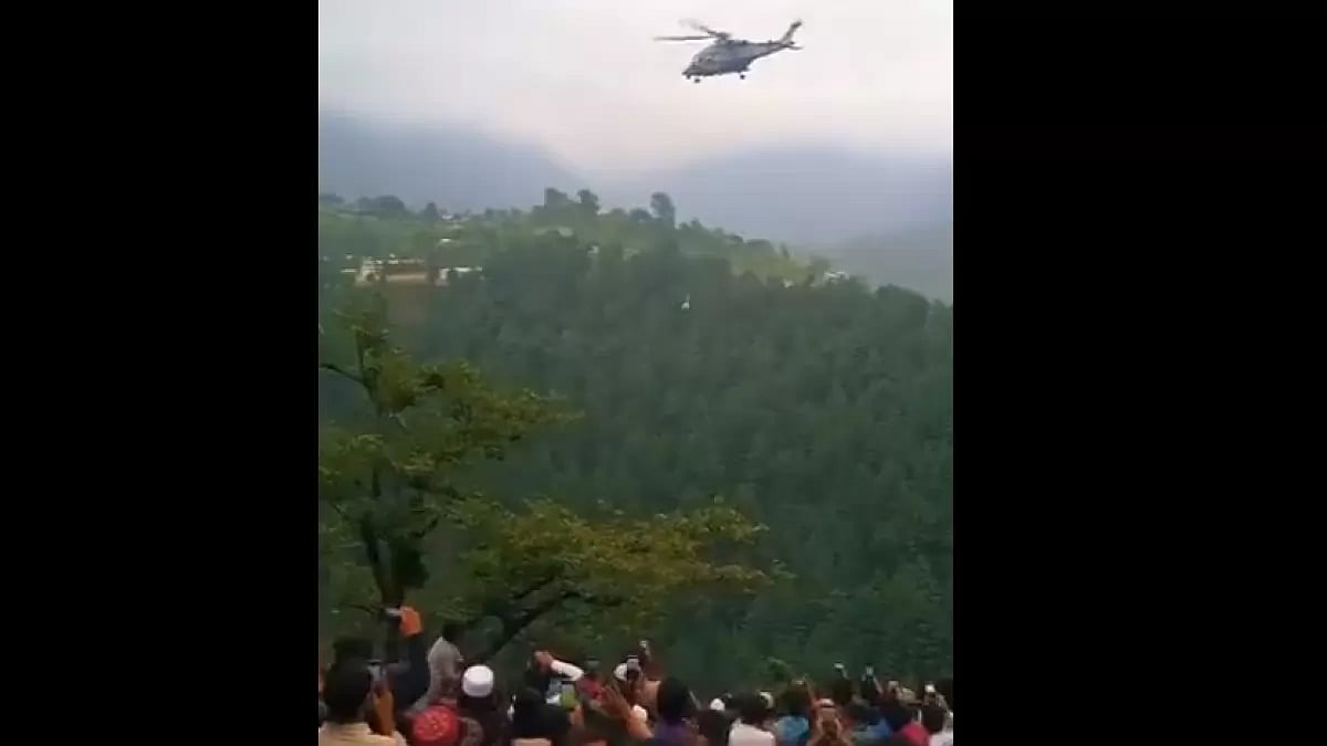 Pakistan Air Force's helicopter rescuing child from cable car in  Battagram