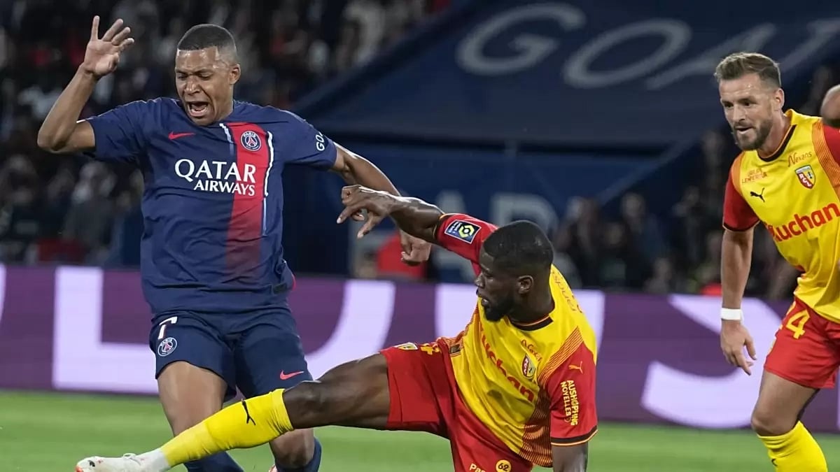 Kylian Mbappe (left) in action for PSG