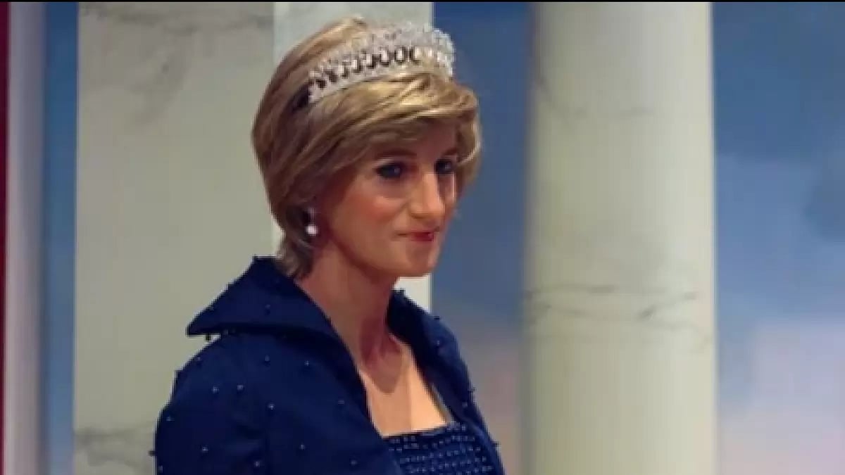 Princess Diana donning an iconic blue dress, paired with a tiara 