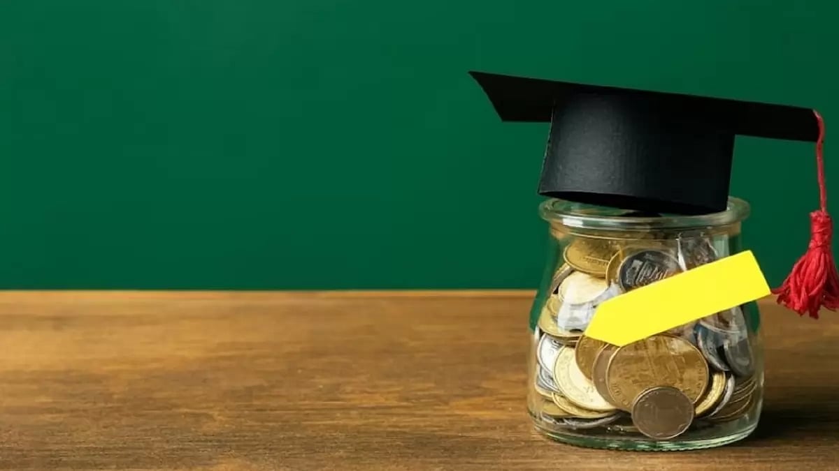  A jar with coins and an academic cap