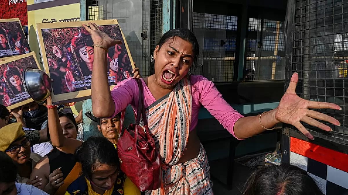 A transgender rights activist shouts slogans during an anti-government demonstration in Kolkata.