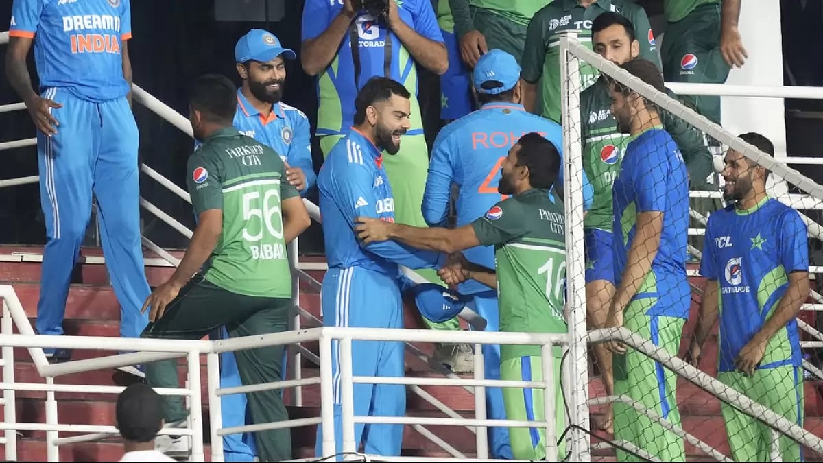 Pakistan and India players after the rained-out match between them in Pallekele.