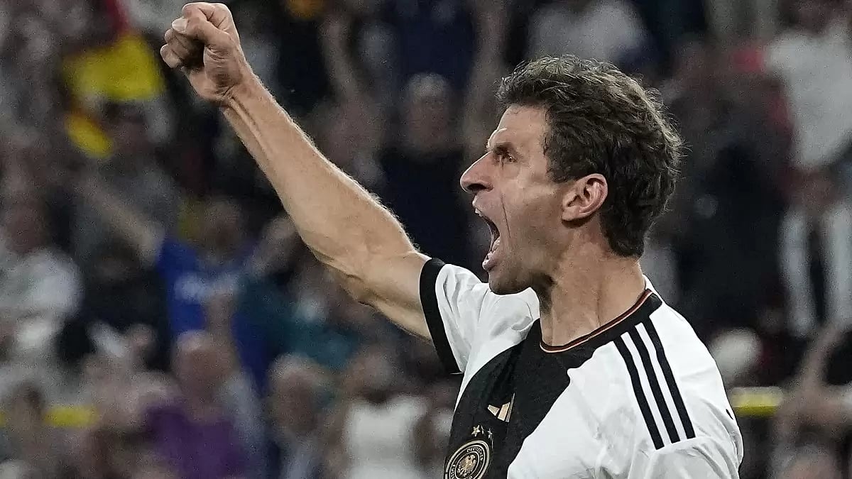 Thomas Mueller celebrates after scoring the opening goal in Dortmund on Tuesday.