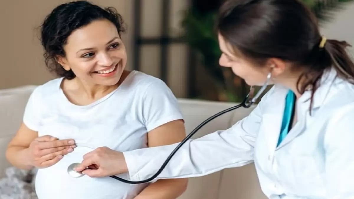 A doctor taking care of a pregnant woman