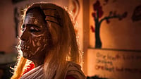 Short Story: Maloti And R Cube A Jatra performer waits to go onstage during an outdoor performance in Kolkata.