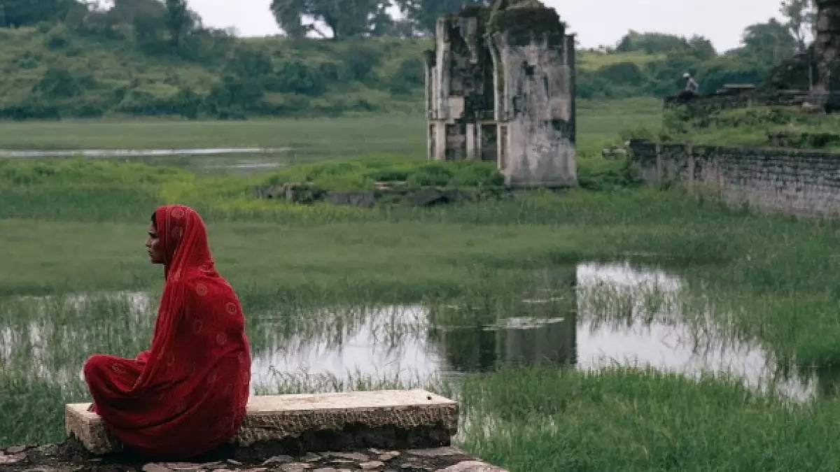 A woman sitting at Mandu, Madhya Pradesh