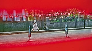 Southern Discomfort: A man walks past a Communist party banner in Kozhikode.