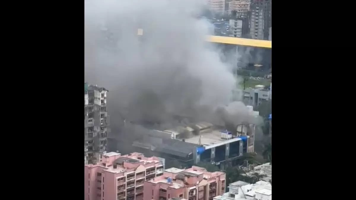 Smoke rises from a mall in Mumbai's Oshiwara