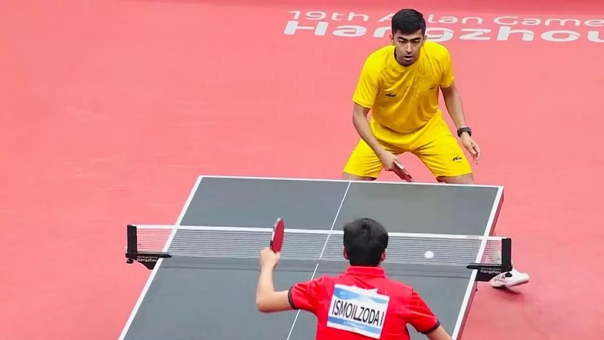 India's Harmeet Desai (R) in action at the Asian Games on Saturday.