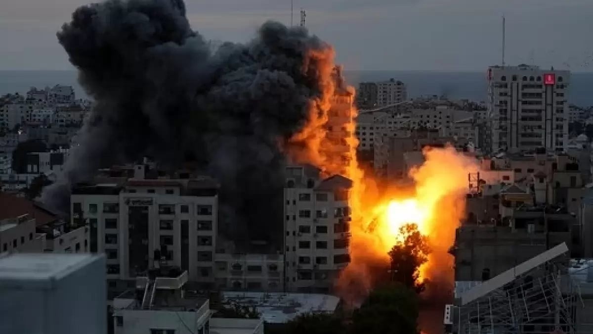 Explosion at an apartment building in Palestine following Israeli airstrikes