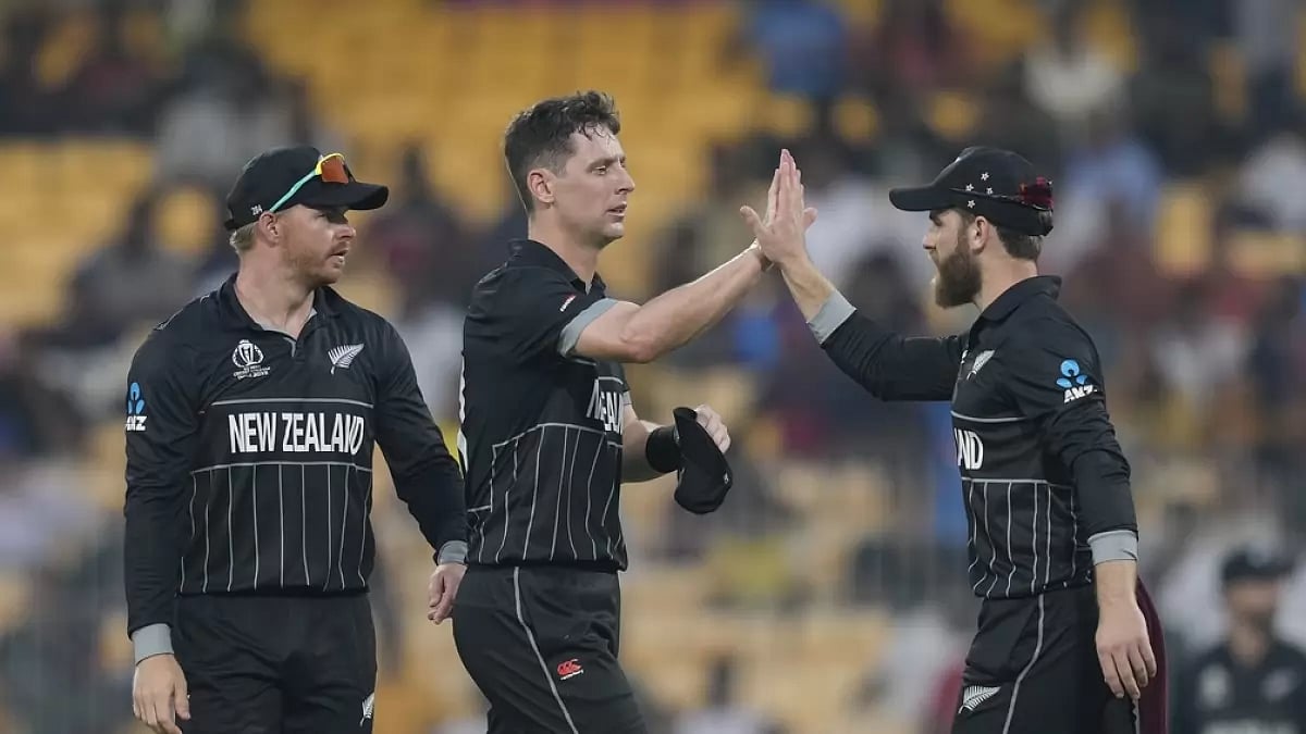 Matt Henry (centre) celebrates a wicket with Kiwi skipper Kane Williamson in Chennai.