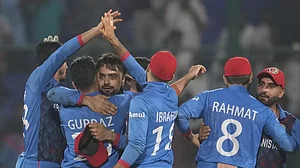 Afghanistan celebrate their remarkable win over England in Delhi.