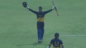 Punjab's Abhishek Sharma celebrates his ton against Andhra in Ranchi.
