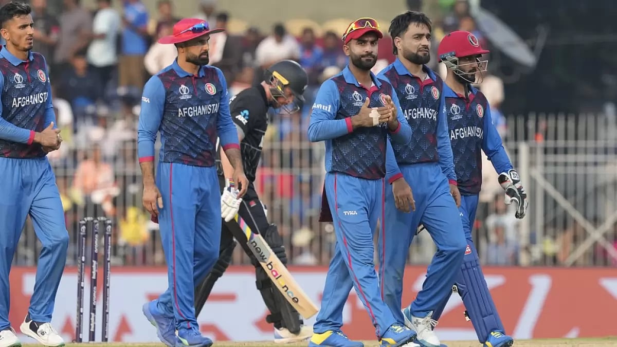 Afghanistan's captain Hashimatullah Shahidi, third right, and Rashid Khan